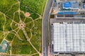 View from the height of the industrial plant and Loshitsky Park in a residential area of Minsk, spring Loshitsky Park and factory