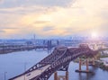 The view from the heights of the evening city of New York. View of the bridges and suburbs of New York at sunset. Royalty Free Stock Photo
