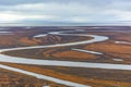 The view from the helicopter to the tundra of the coast of the Arctic Ocean.