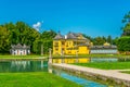 View of Hellbrunn palace, pond and garden near Salzburg, Austria....IMAGE