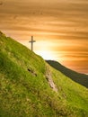 View with the Heroes Cross on Caraiman peak at sunset, in Bucegi Mountains Romania Royalty Free Stock Photo