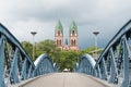 View of the Herz Jesu Church and the Wiwili BrÃÂ¼cke bridge in Freiburg im Breisgau, Germany Royalty Free Stock Photo