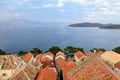 A view high above of the old town of Korcula from the bell tower, looking out at the orange tiled roofs