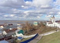 View from the high bank of the Oka River in the street Christmas and Church of Elijah the Prophet.