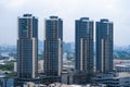 View from the high floor of the streets of Bangkok. Tall buildings and roofs of small houses. City landscape Royalty Free Stock Photo