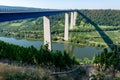 View on high freeway viaduct bridge across Mosel river valley and terraced vineyards, road network and transportation is Germany