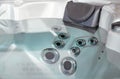 high pressure nozzles of a jacuzzi bath tubs at spa with headrest Royalty Free Stock Photo