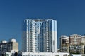 View of a high-rise building that leaves its floors in the blue sky