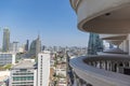 View of high-rise facades through a structure from balconies during the day Royalty Free Stock Photo