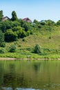 The picturesque bank of the Volga River from the ship.