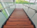A View From High To The Bottom Of A Modern Luxury Staircase In A Office Building Glass Transparent Side Hand Guard Handrail