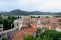 A view from high up looking down onto the small medieval town of Ston, Croatia.  The rocky fortress is an ancient defensive wall Royalty Free Stock Photo
