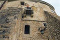 View of high wall with window and embrasure in ancient Olesko castle. Lviv region in Ukraine. Cloudy summer day Royalty Free Stock Photo