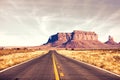 View from highway 163 in Monument Valley near the Utah-Arizona border,  United States. Toned image Royalty Free Stock Photo