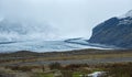 View from highway road during auto trip in Iceland. Spectacular Icelandic landscape with  scenic nature: hamlets, mountains, ocean Royalty Free Stock Photo