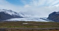 View from highway road during auto trip in Iceland. Spectacular Icelandic landscape with  scenic nature: hamlets, mountains, ocean Royalty Free Stock Photo