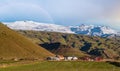 View from highway road during auto trip in Iceland. Spectacular Icelandic landscape with scenic nature: hamlets, mountains, ocean Royalty Free Stock Photo