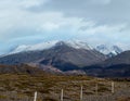 View from highway road during auto trip in Iceland. Spectacular Icelandic landscape with scenic nature: hamlets, mountains, ocean Royalty Free Stock Photo