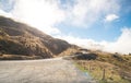 View of highway road on the famous Crown Range Road, the highest paved highway in Cardrona valley, Otago region of New Zealand. Royalty Free Stock Photo