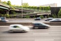 Speeding cars driving on the A4 highway in the suburbs of Paris with motion blur.