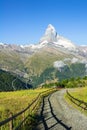 View of hiking trail in Swiss Alps, Zermatt Mountains area near Matterhorn Peak in summer, Switzerland