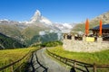 View of hiking trail in Swiss Alps, Zermatt Mountains area near Matterhorn Peak in summer, Switzerland