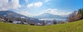 view from the hill above to tourist resort and lake Tegernsee, bavarian landscape panorama early spring Royalty Free Stock Photo