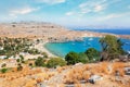 View from the hill of the Acropolis on the Mediterranean coast in the city of Lindos, Rhodes island, Greece Royalty Free Stock Photo