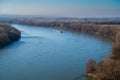 View from the hill on the Danube river in Bratislava. There is a cargo ship on the river. Autumn Royalty Free Stock Photo