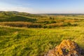 View from the hill on meadows and the settlement. Royalty Free Stock Photo
