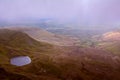 View from the hill at the mystical lake Llyn Cwm Llwch, near Pen y Fan peak, Brecon Beacons , Wales, UK Royalty Free Stock Photo