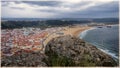 View from the hill to the beach and town. Nazare, Portugal.