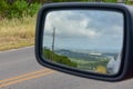 View of the hills and a lake in the Rear View