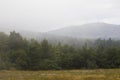 View of a hills and mountains from a observatory in dense fog