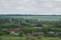 View from the hills to a village in a green valley Royalty Free Stock Photo