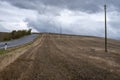 View on hills of Tuscany, Italy. Tuscan landscape with ploughed fields in autumn Royalty Free Stock Photo