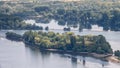 view on hillside vineyards along the Rhine River and the fulder aue island in the rhine near ruedesheim