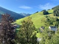 View of Hinterglemm hotels and skiing lift in the mountains of the Saalbach-Hinterglemm skiing region in Austria on a