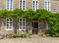 View of the historic Breiz Izel Creperie in the picturesque French village of Locronan