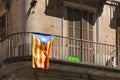 View of the historic building in Barcelona center with blue Estelada flag on the balconies. The Estelada is an unofficial flag