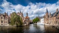 View of the historic buildings and the Belfort Tower from the Dijver canal in the medieval city of Brugge Royalty Free Stock Photo