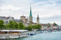 View of the historic buildings and bridge of Zurich at the bank of Limmat River and Zurich lake, with landmark of FraumÃÂ¼nster