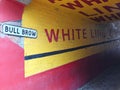 View of the historic bull brow passage in rochdale with painted victorian advertisements