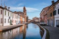 Ponte degli sbirri in Comacchio, Italy with Delta Antico museum Royalty Free Stock Photo