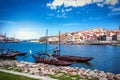 View of the historic center of Porto, the Douro river and the typical Rabelo boats used to carry port wine Royalty Free Stock Photo
