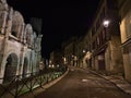 View of historic center of Roman town Arles in Provence, France in the evening with famous amphitheatre. Royalty Free Stock Photo