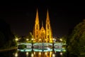 View at the historic church of Saint Paul with the river Ill in Strasbourg at night, Royalty Free Stock Photo