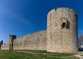 view of the historic city walls surrounding the Camargue village of Aigues-Mortes