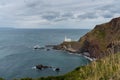 View of the historic Hartland Point lighthouse and headland on Bristol Bay Royalty Free Stock Photo