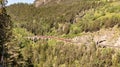 View of the historic Landwasser Viaduct with a train